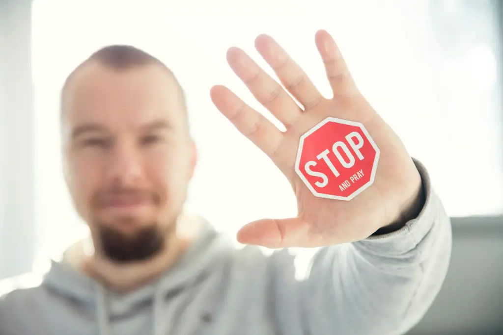 Stop sign on hand is one of the funny ways to say no