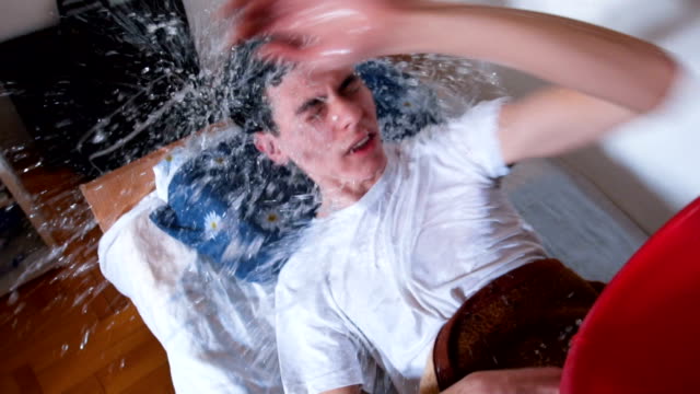 Man wakes up with water splash