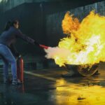A common individual extinguishing the fire
