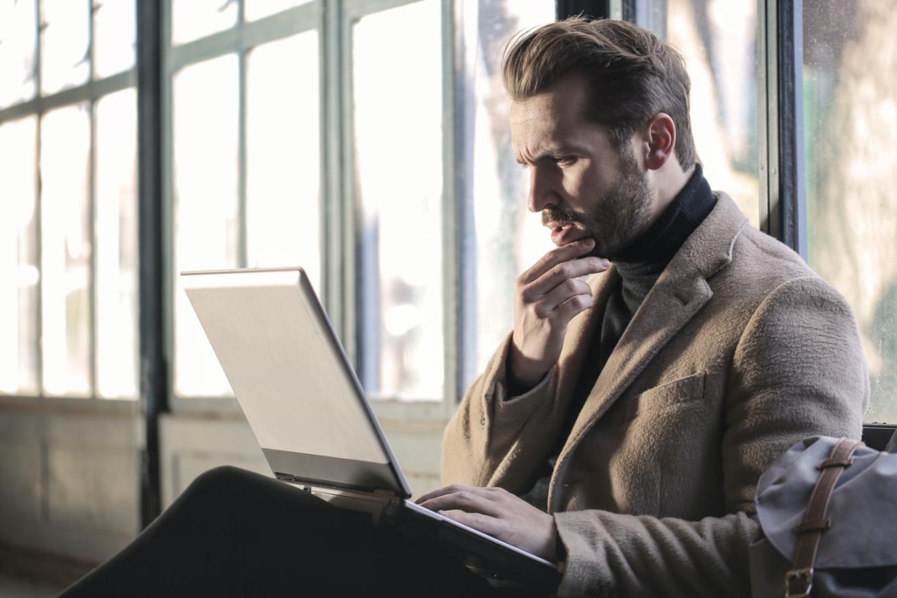 A person confused during his work