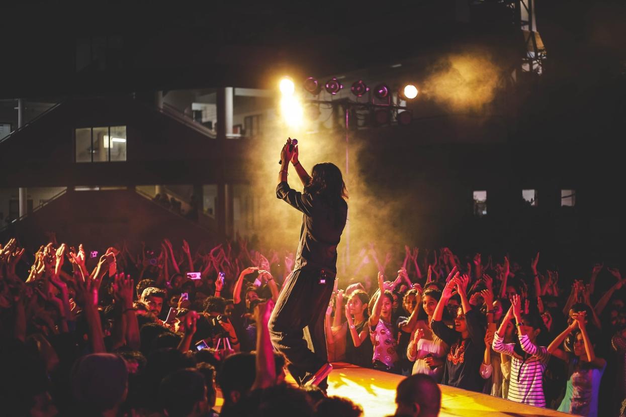 Performing music in front of crowd
