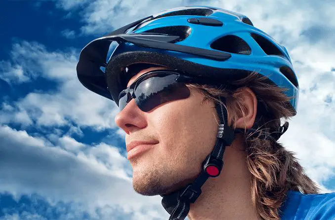 A cyclist wearing sunglasses