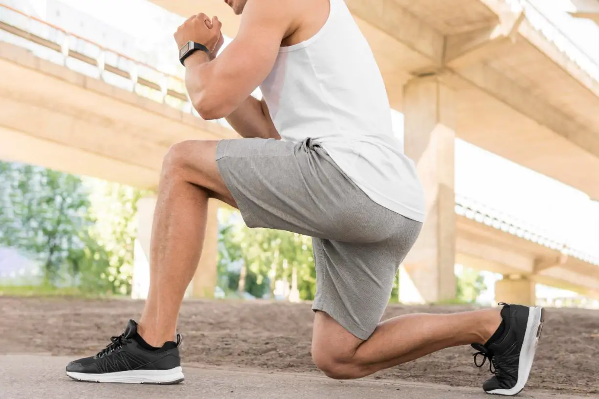 A person stretching his legs to increase the strength