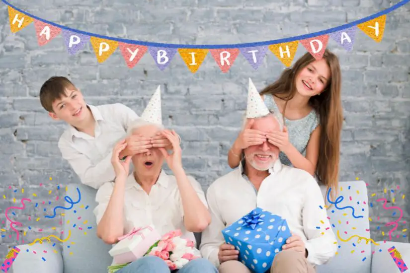 A girl and a boy, putting their hands on their grandpa's and grandma's eyes, respectively, giving them a birthday surprise