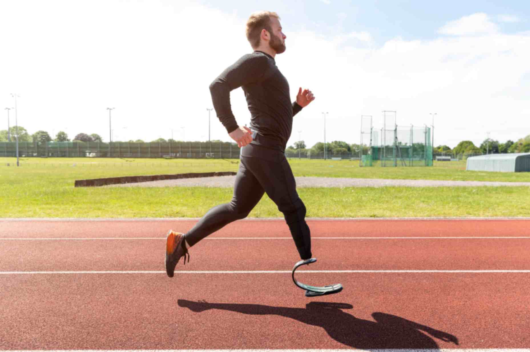 Short man with prosthetic leg running