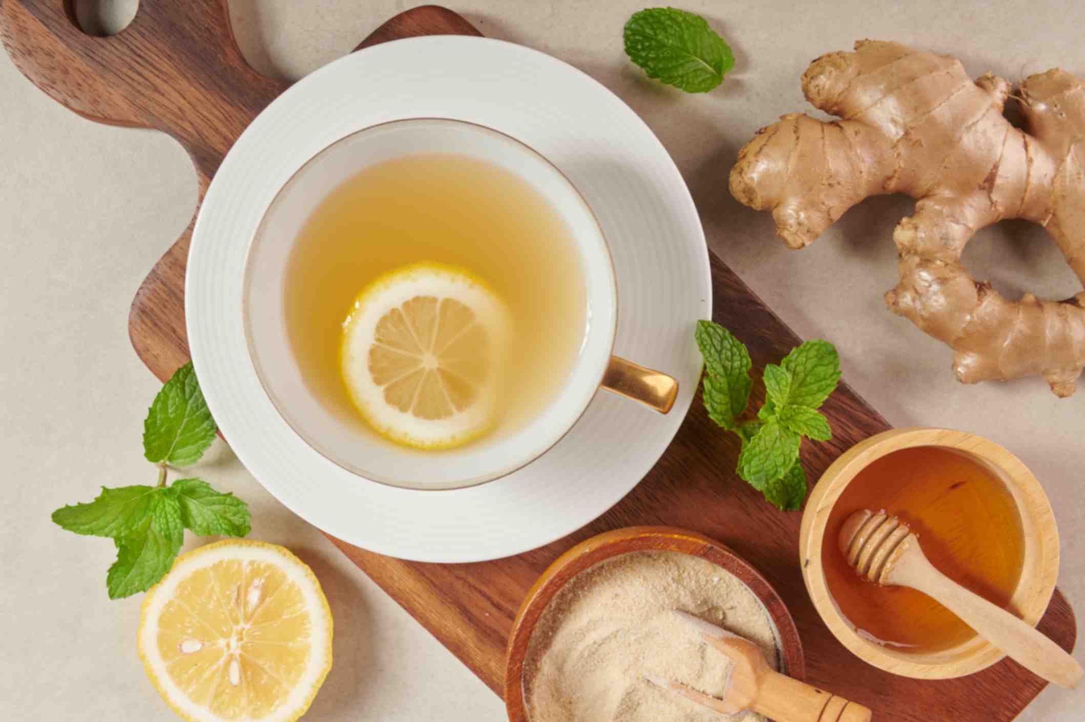 Top view of Ginger tea and its ingredients i.e. lemon, honey