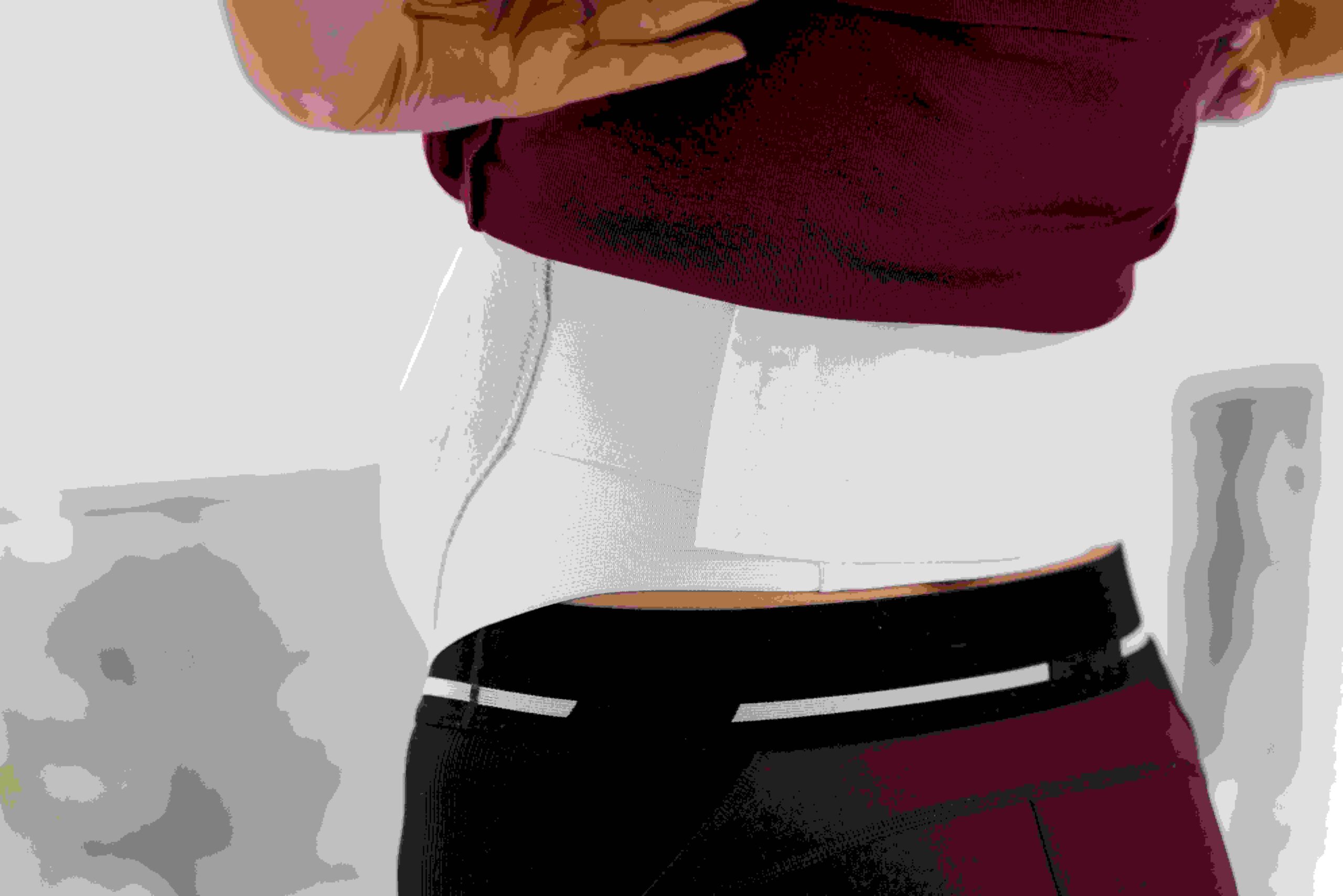 Pregnant Woman Wearing Body Compressing Garment