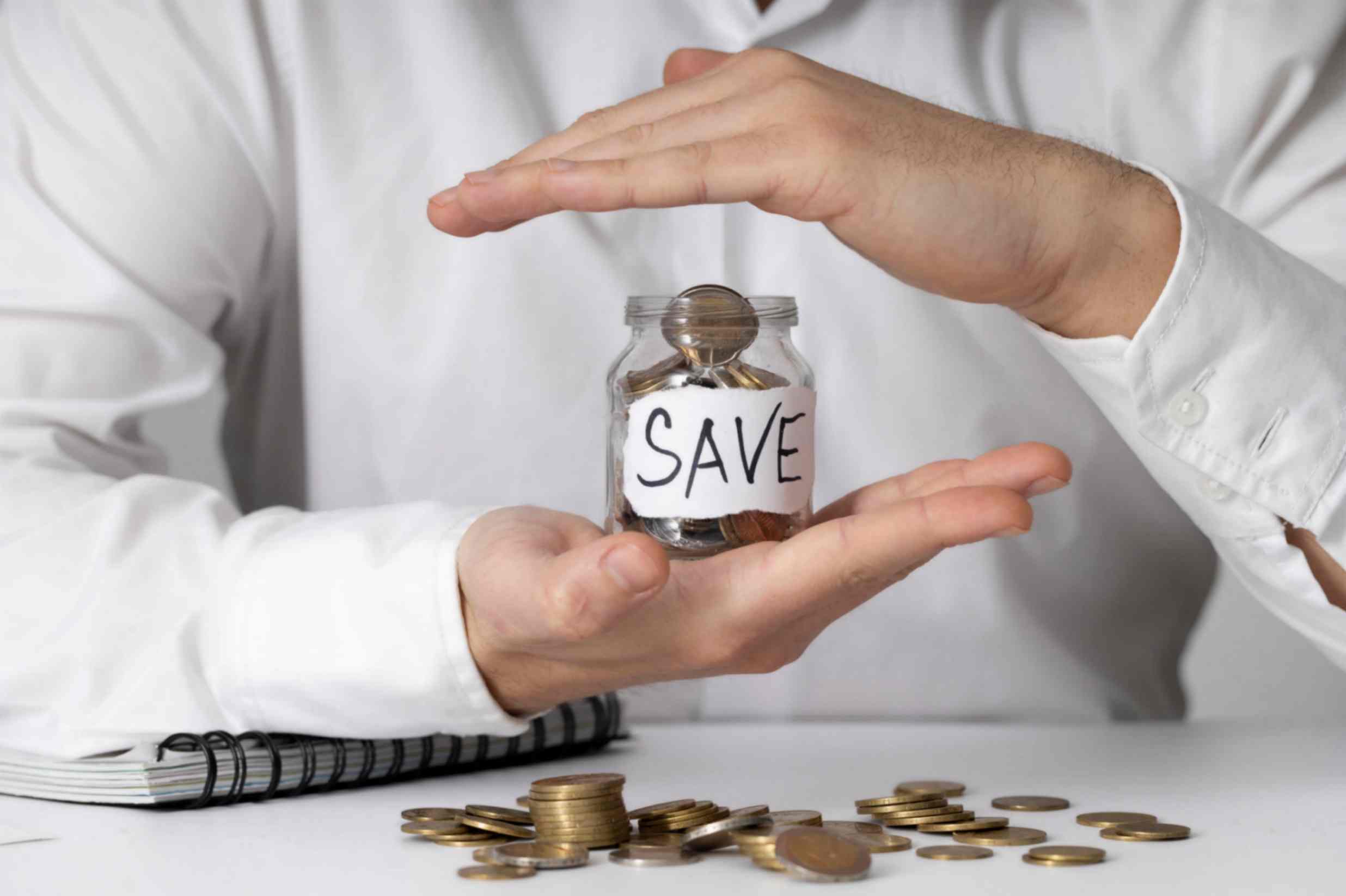 Saving Money in Jar 