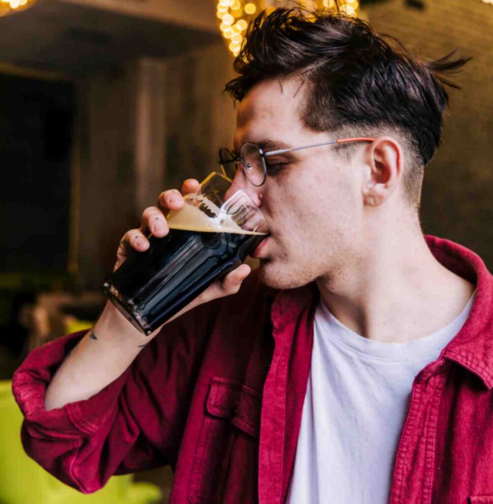 Men is Drinking Coke to Quench His Thirst 
