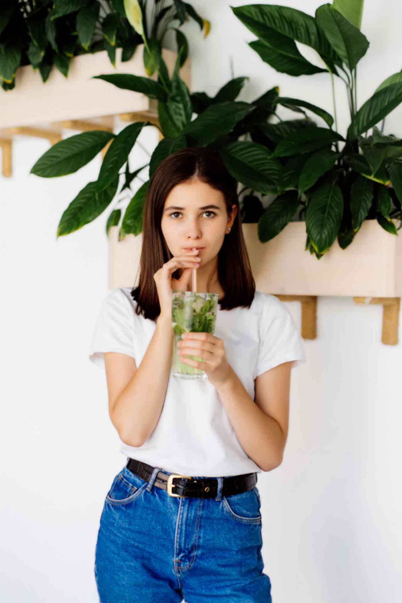 Young Women Drinking Green Juice