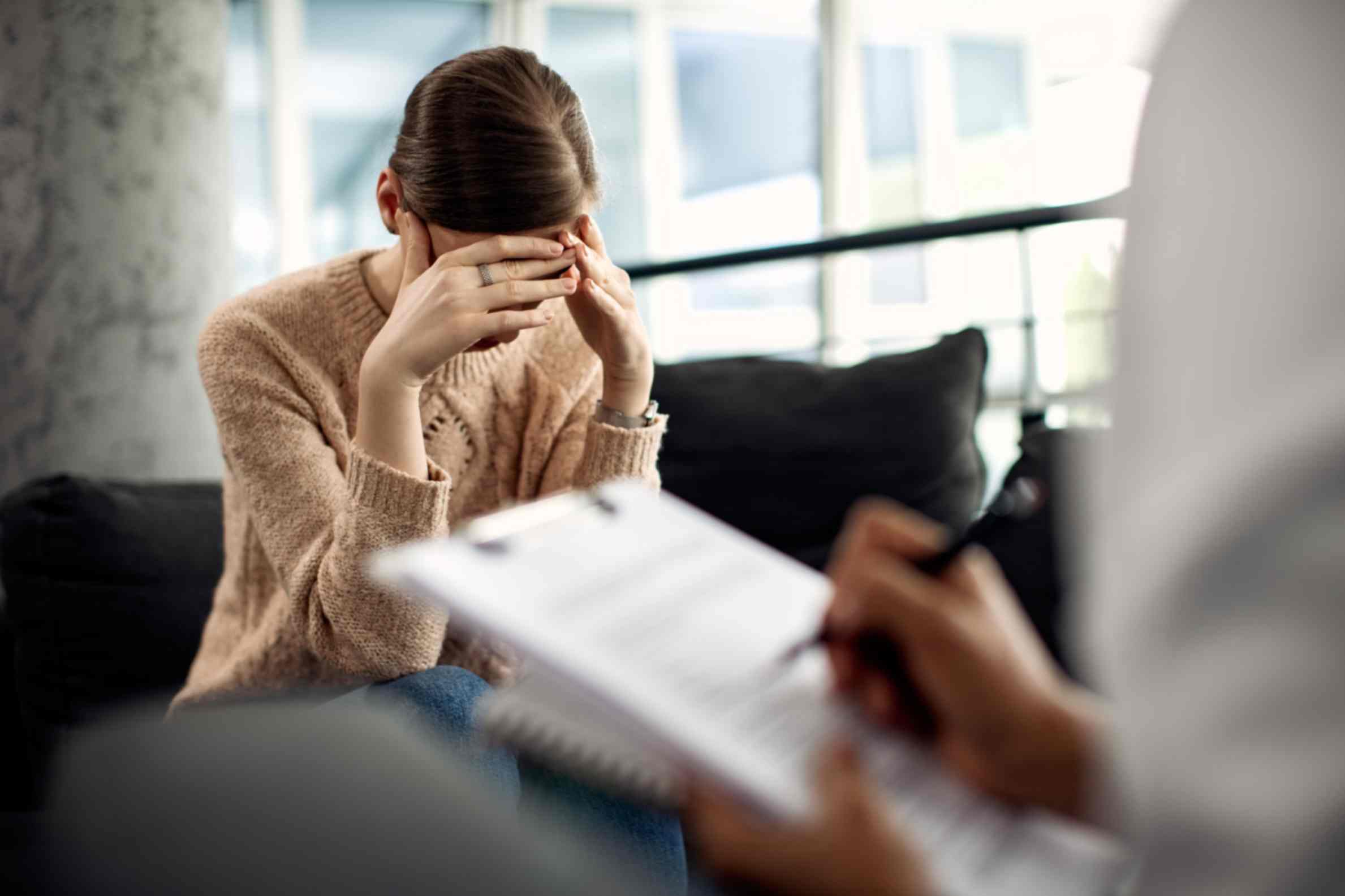 Depressed Woman having psychotherapy session