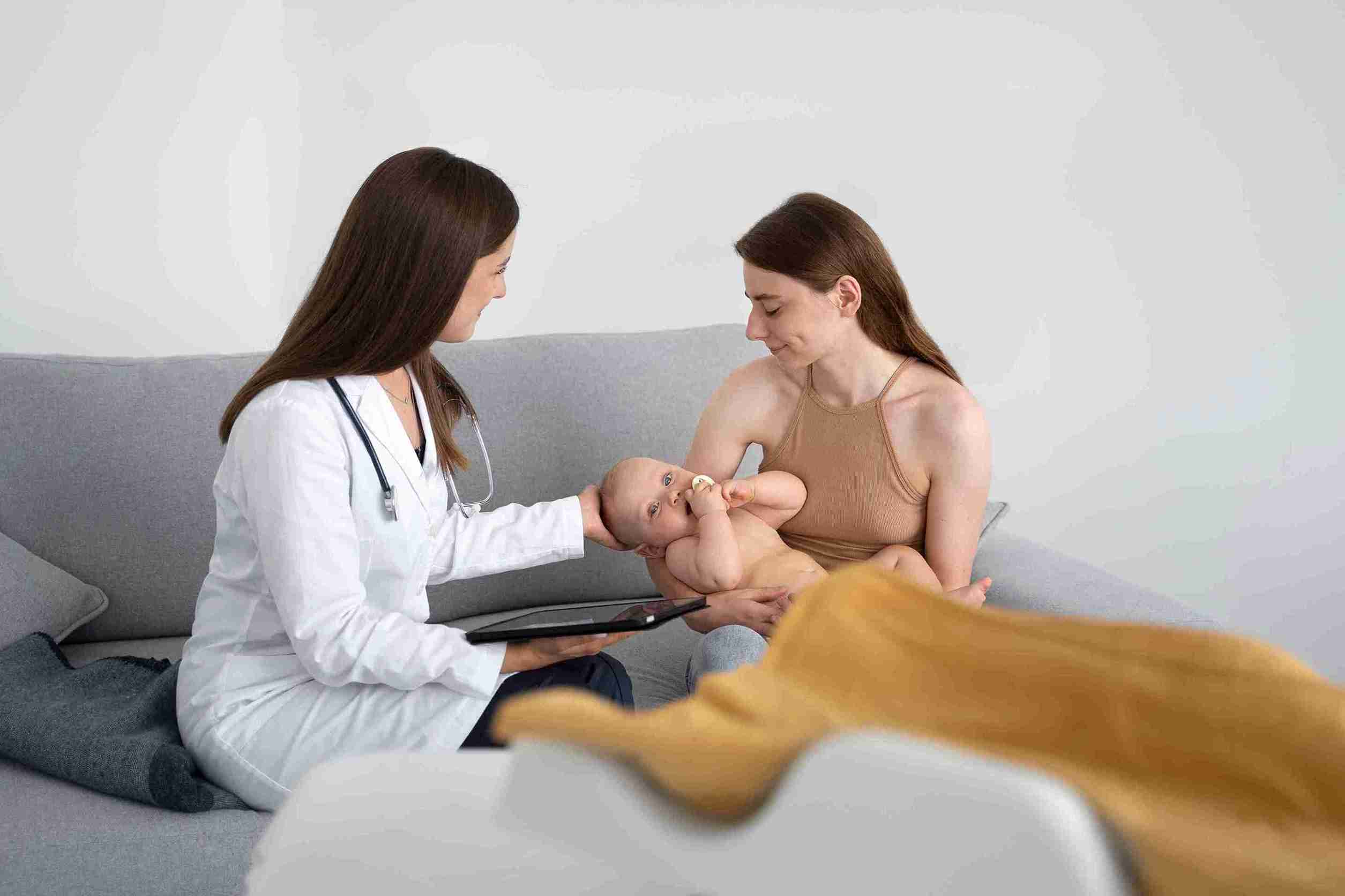 Doctor is checking the baby's health