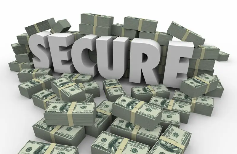 "Secure" placed amidst piles and piles of dollar bundles.