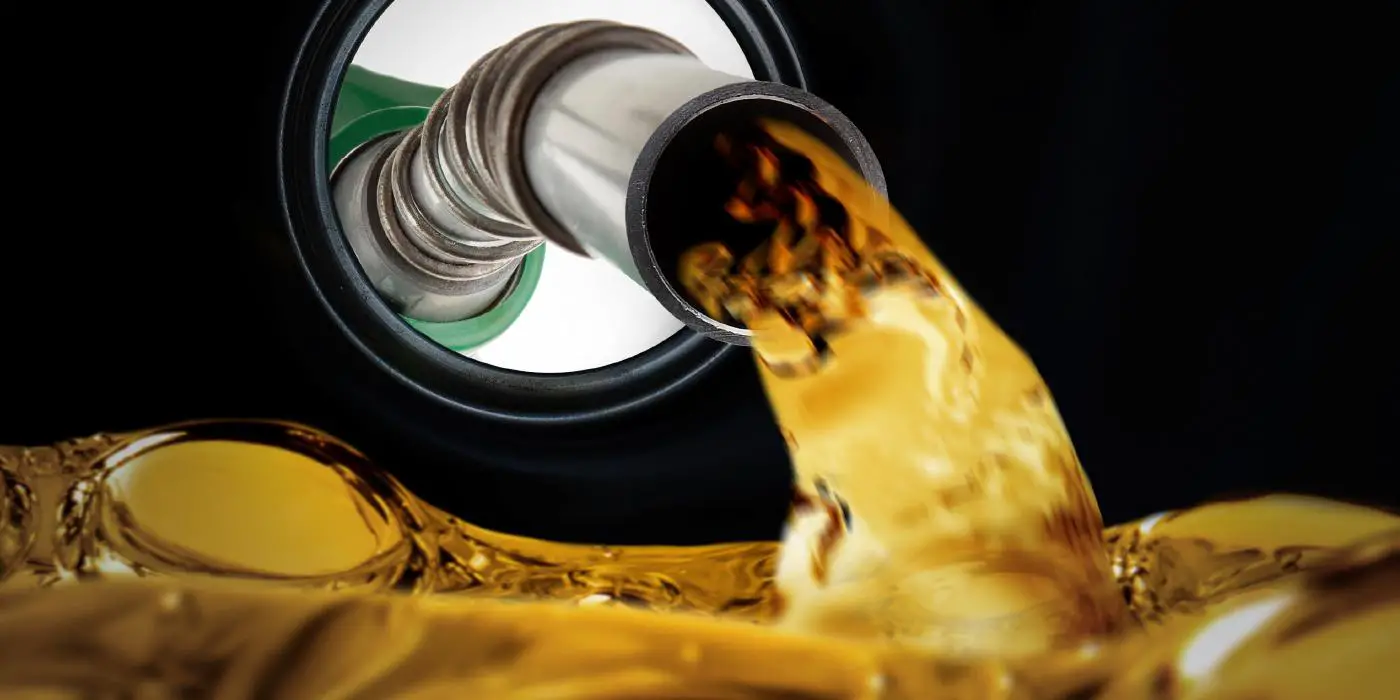 Fuel flowing from a Hose in a Reservoir