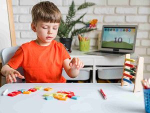 Kid Playing Letters Game