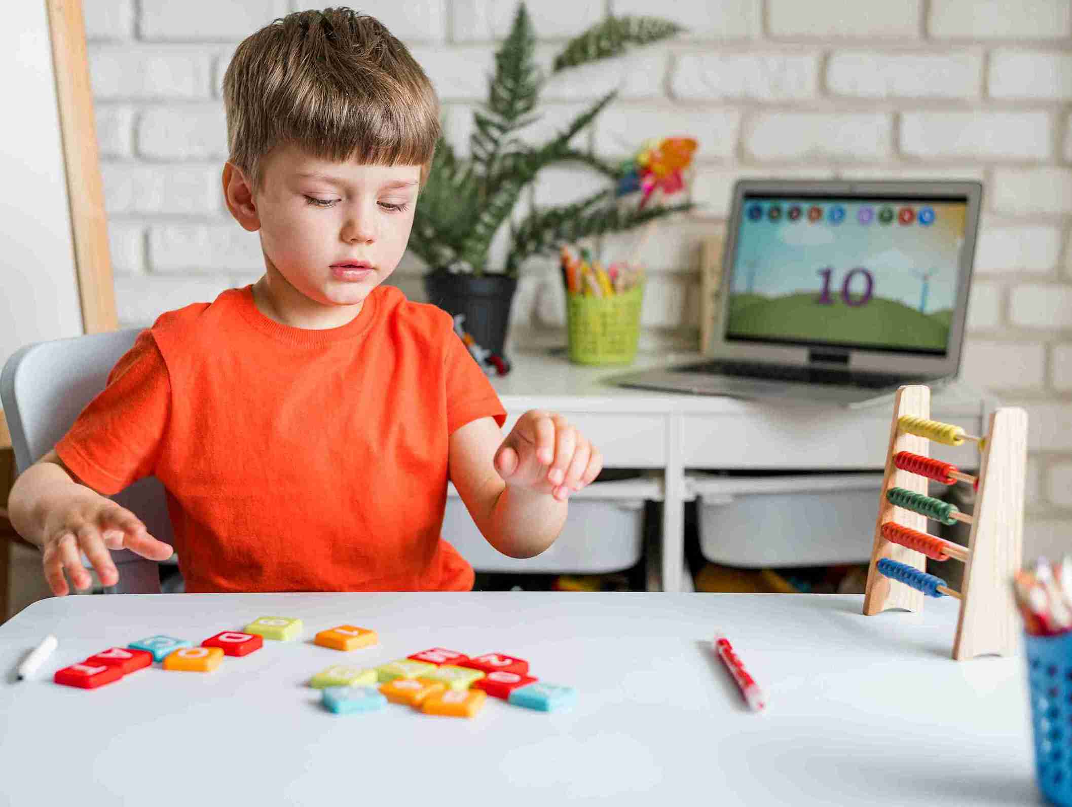 Kid Playing Letters Game