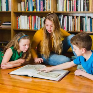 Kids are Looking at Picture in the Book