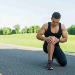 Man Practicising Sport Squatting