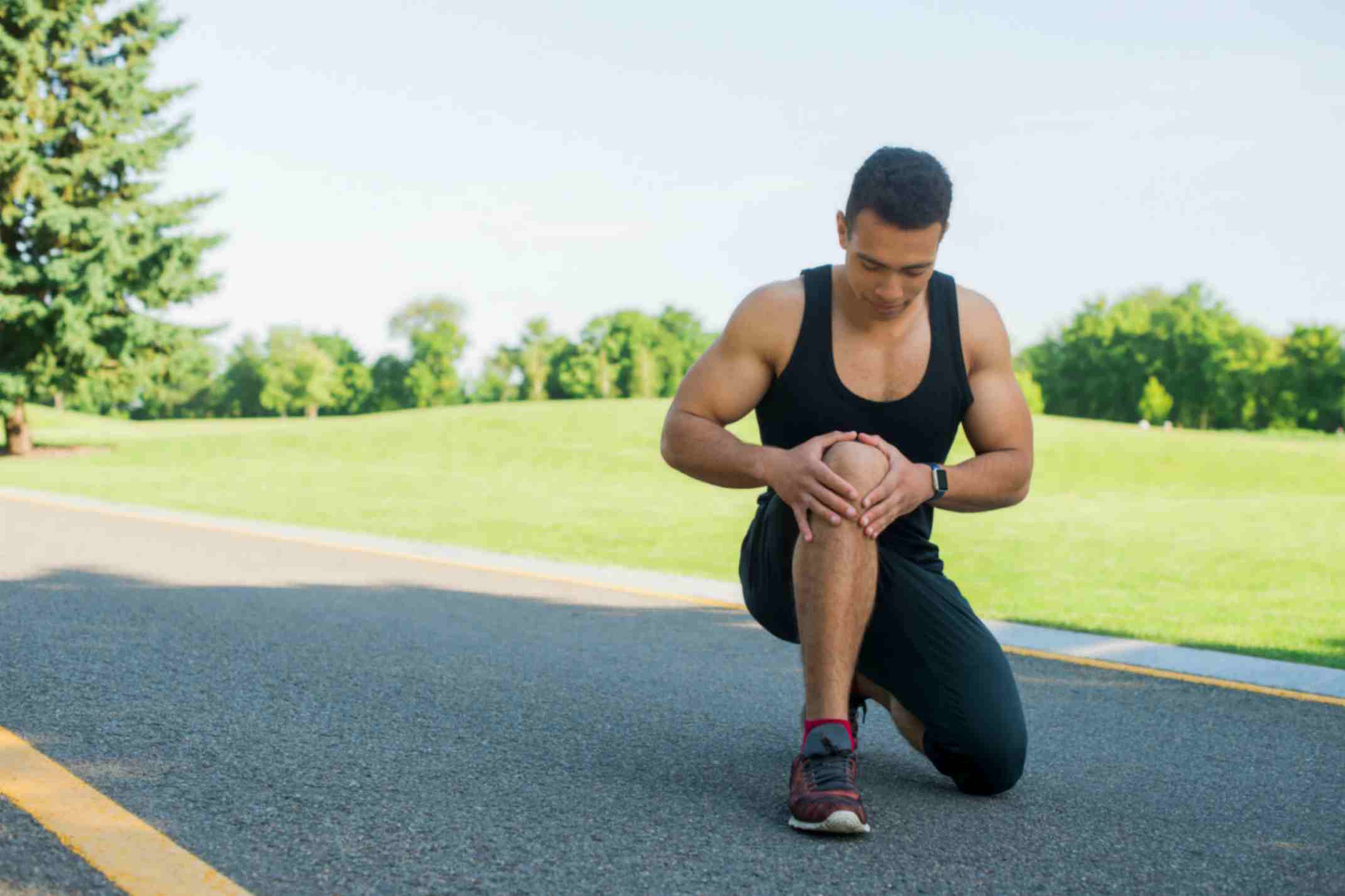 Man Practicising Sport Squatting