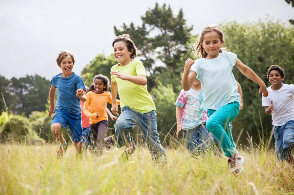 Kids running in grass