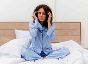 Young Women Having Headache Due to Stress
