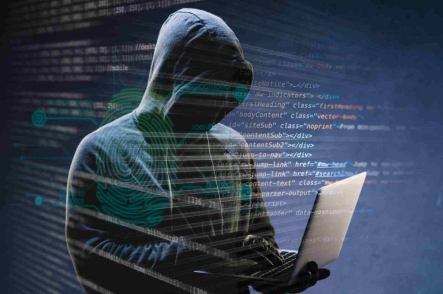 Picture shows a hacker using laptop 