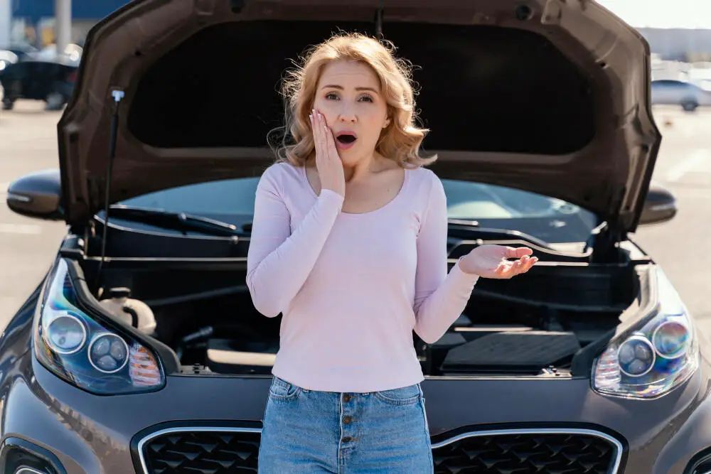 shocked woman with car