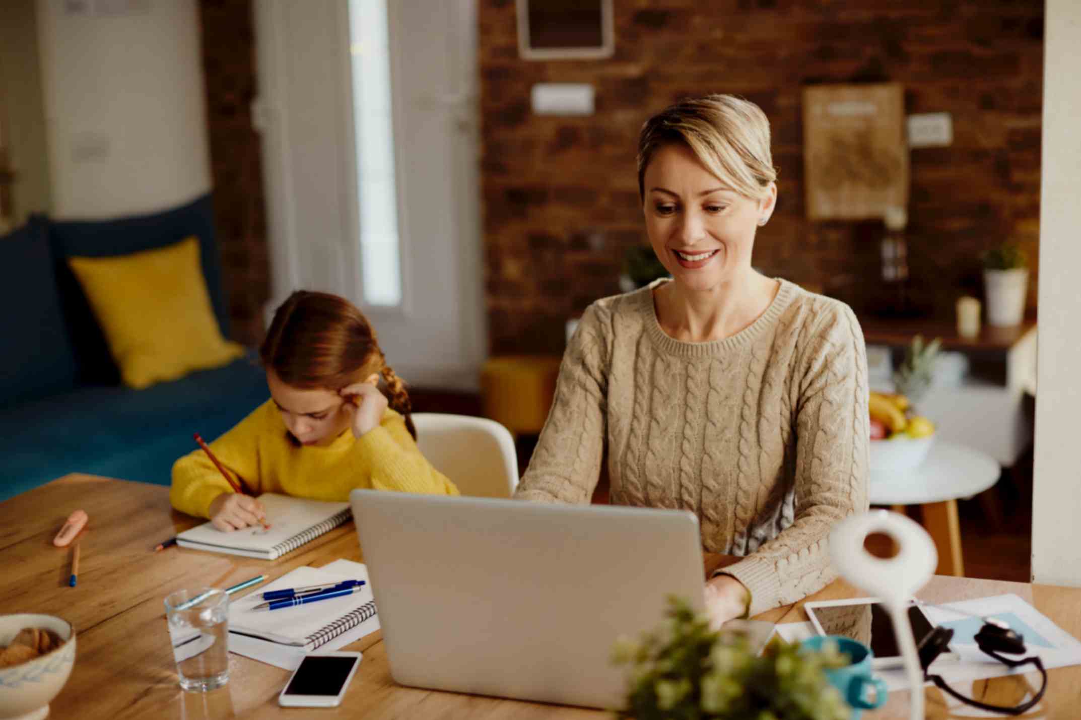 Happy Mother Working From Home