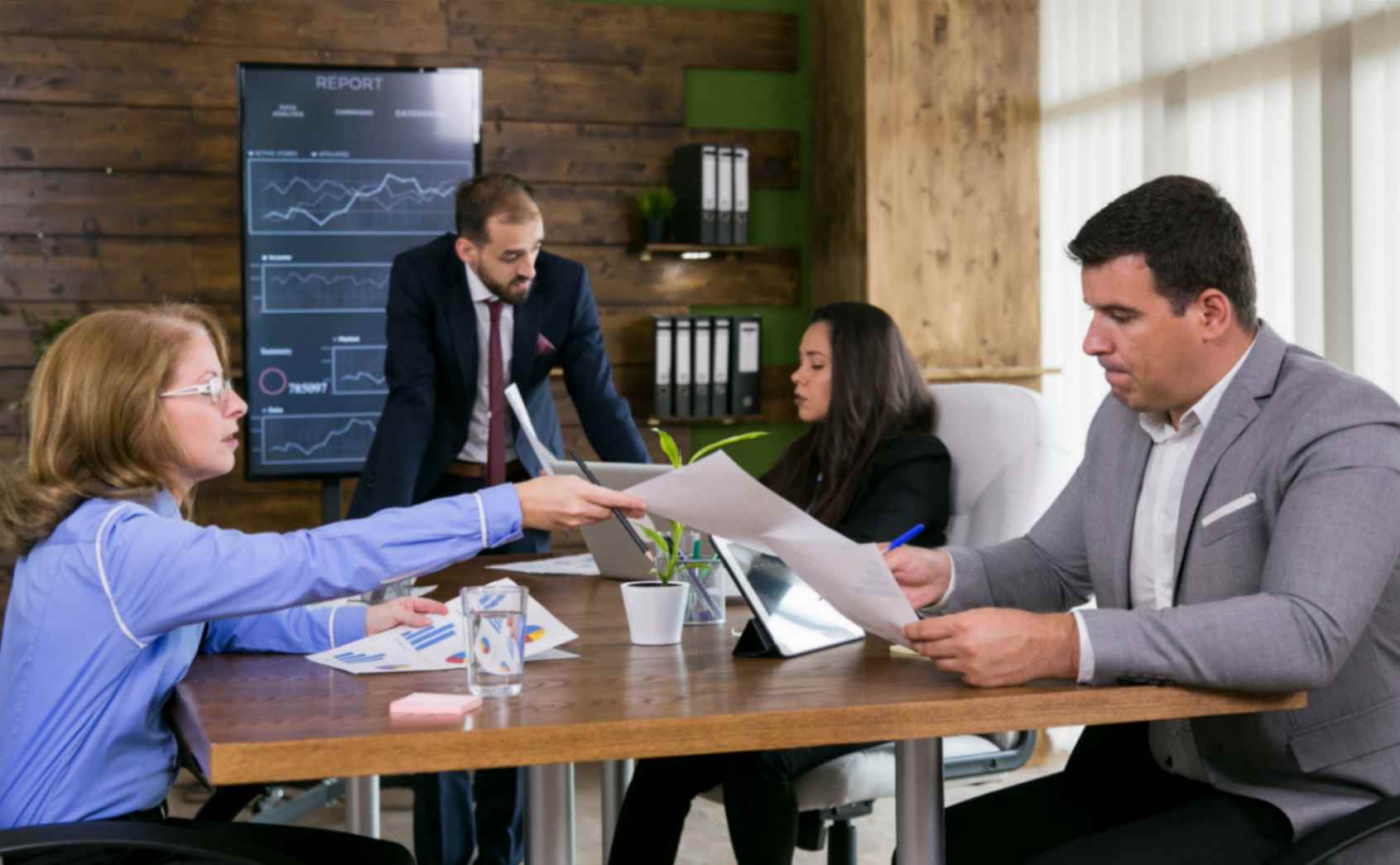 Manager explaining new process to a team