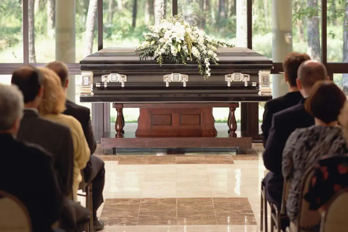 People gathered in the funeral ceremony of their loved one