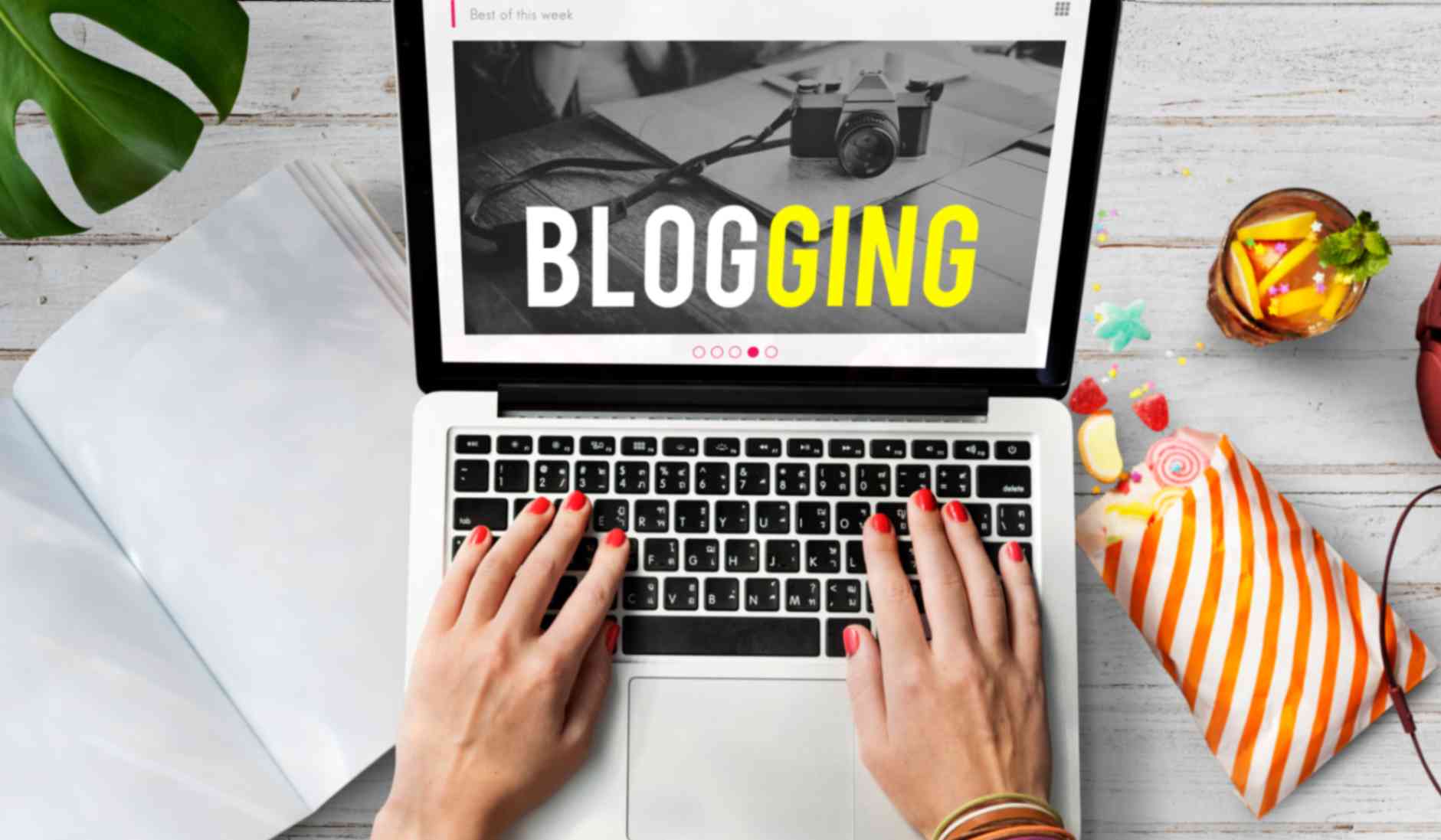 Picture of laptop showing A blogging page placed on table