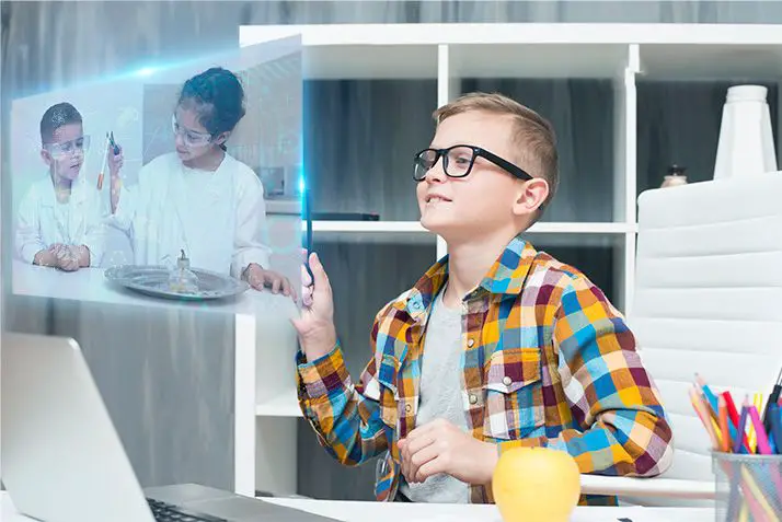 A child working with floating screens