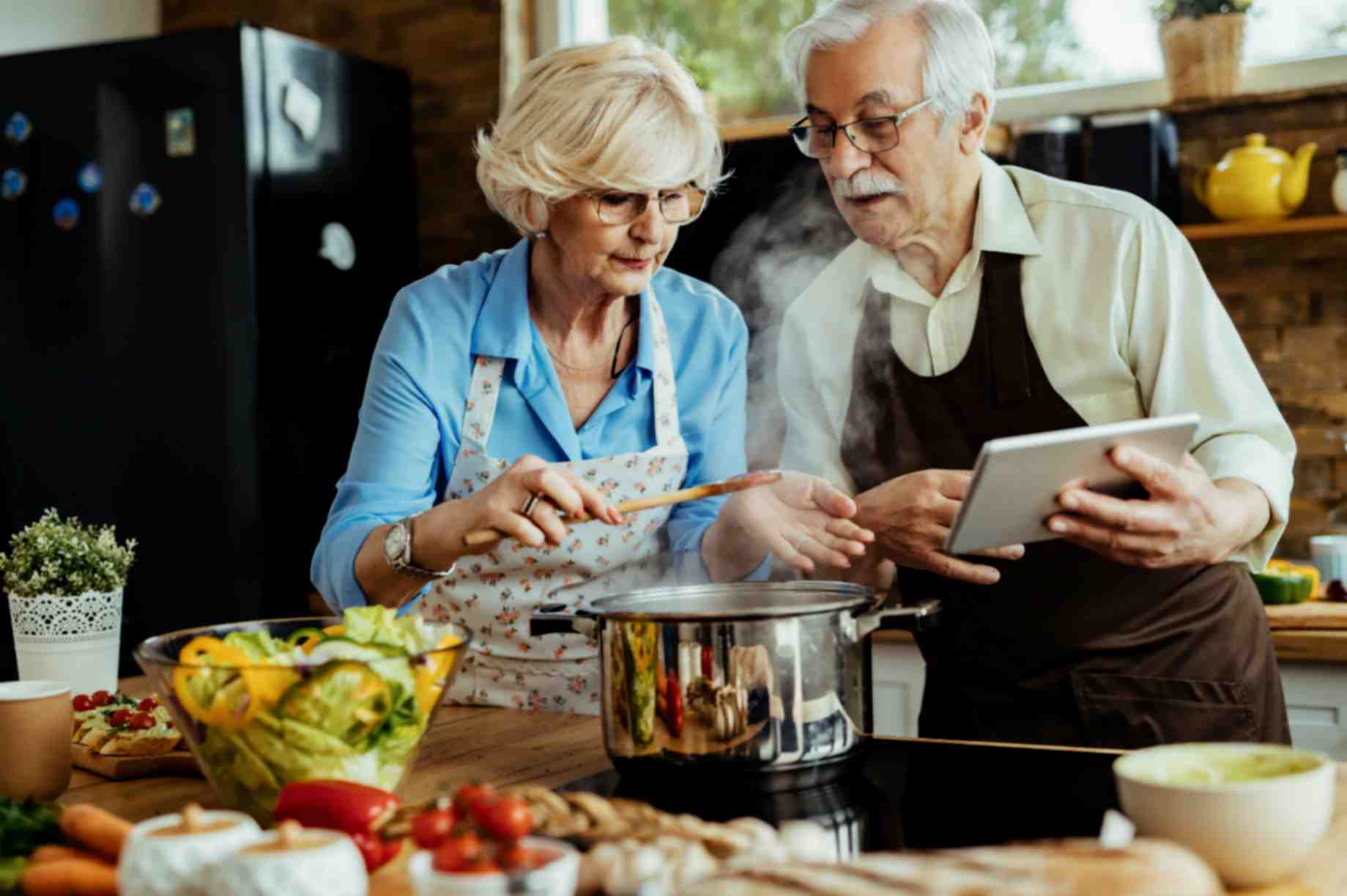 Senior Couple Cooking Together