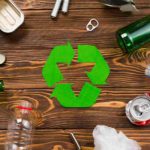 Various reusable trash around recycling symbol