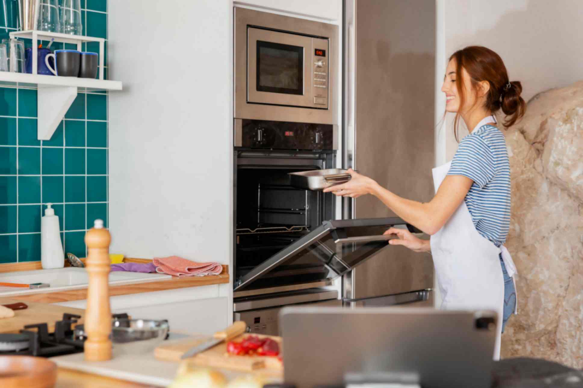 Women Cooking in Oven