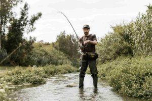 Young Man is Fishing