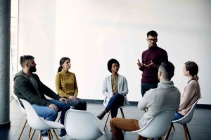 Young Man Talking About His Problems Group Psychotherapy