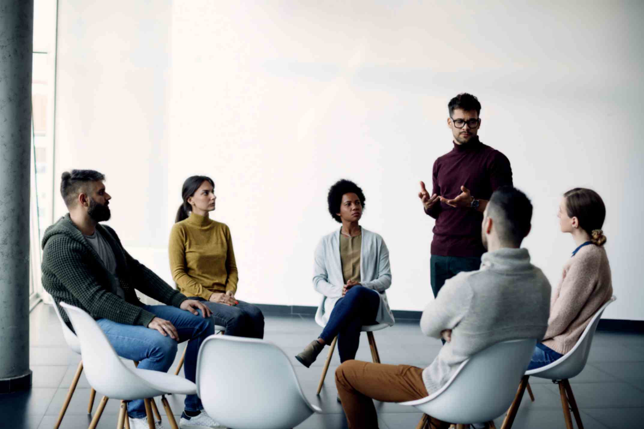 Young Man Talking About His Problems Group Psychotherapy