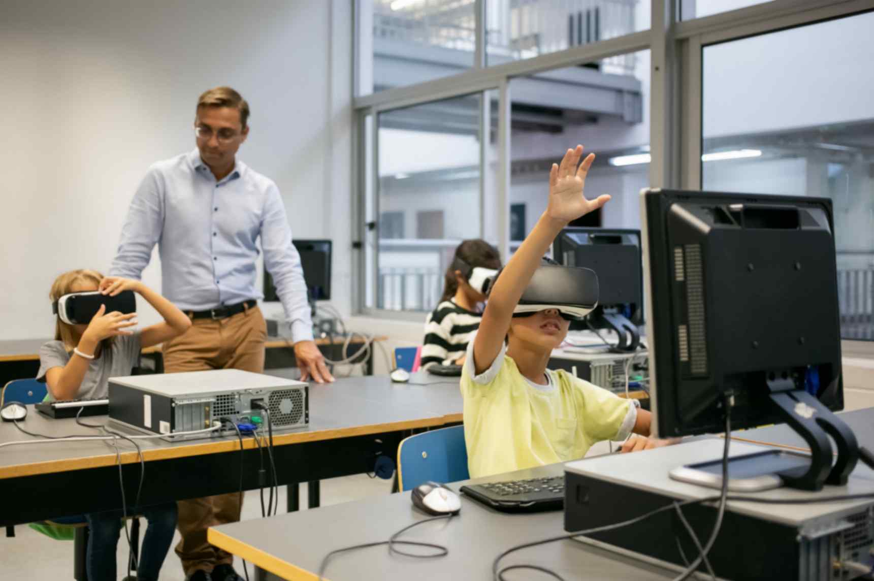 group multiethnic kids wearing vr-headsets teacher watching them 