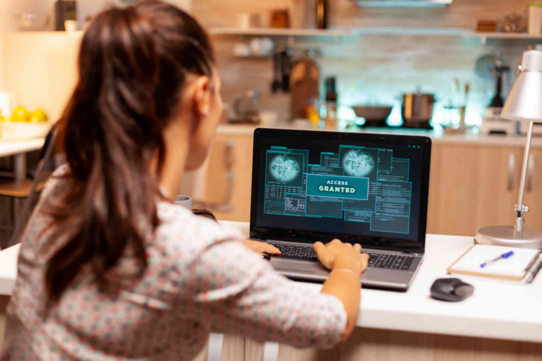 hacker woman launching cyberattack bank