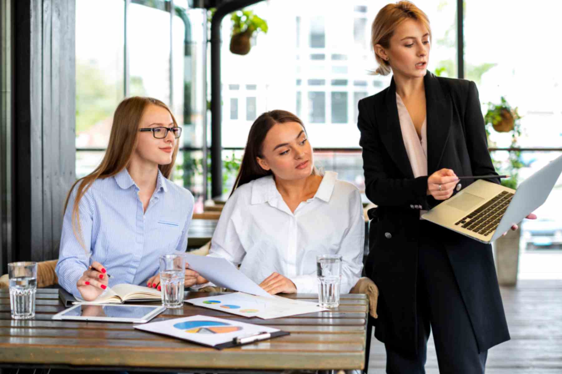 Women working together in office